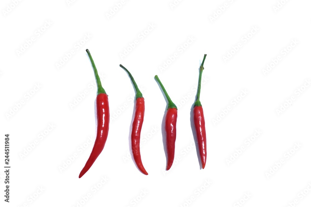 A group of red hot tropical chilli on white isolated background 