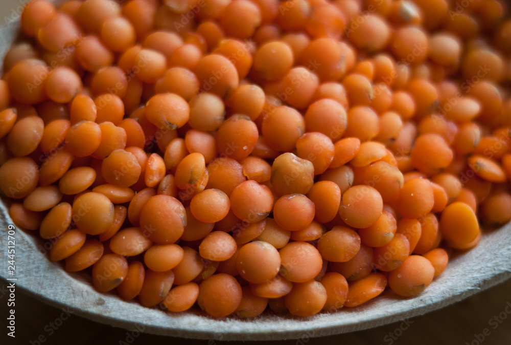 lentils seeds in wooden spoon lentils seeds in wooden spoon