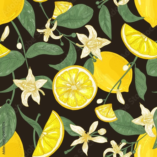 Botanical seamless pattern with lemons, whole and cut into pieces, branches w...
