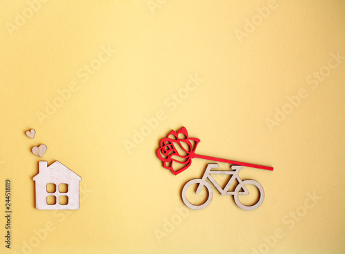 love/valentines/anniversary/ birthday card with wooden figures of birds,hearts, roses, bicycle/top view