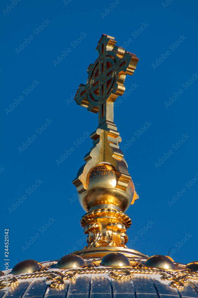 Fototapeta premium Golden Cross on the dome of the Orthodox Church.