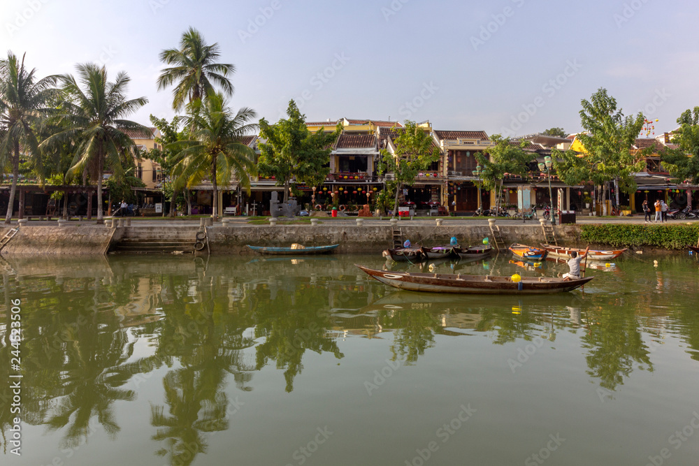 Waterfront view of Thu Bon River, at Hoi An ancient town historic district, UNESCO world heritage site. Its a popular travel destination, Vietnam.