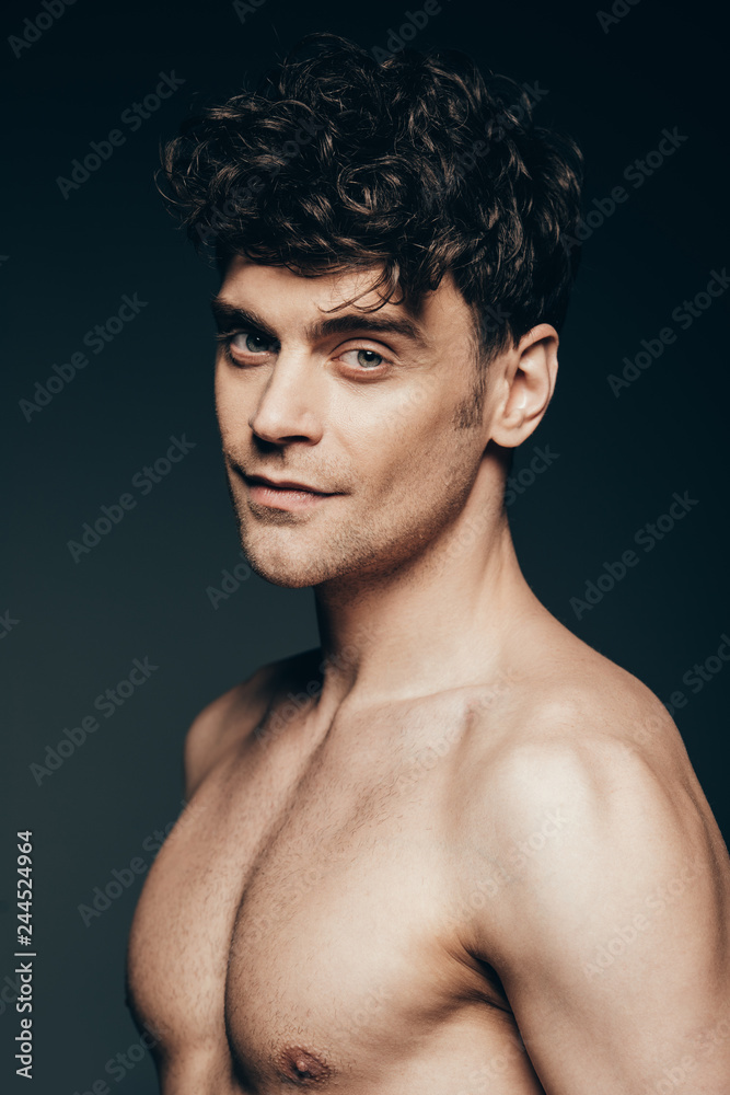 portrait of handsome man isolated on dark grey portrait of handsome man isolated on dark grey