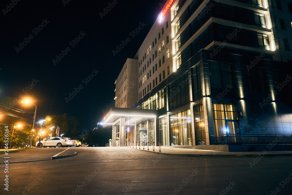 Fototapeta premium illuminated building in the city at night