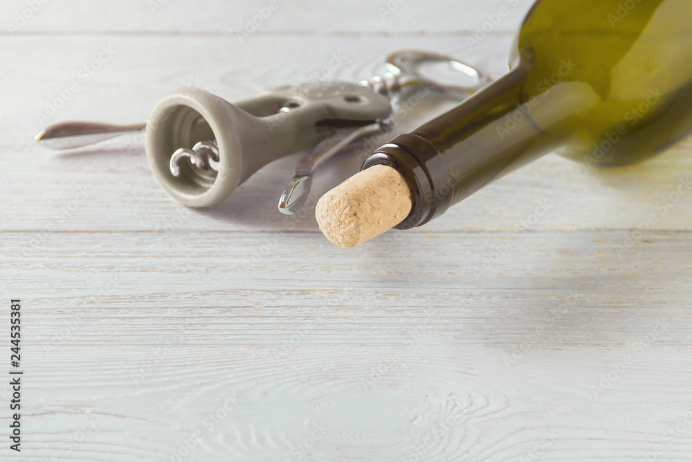 wine bottle on white wooden table with copy space, background