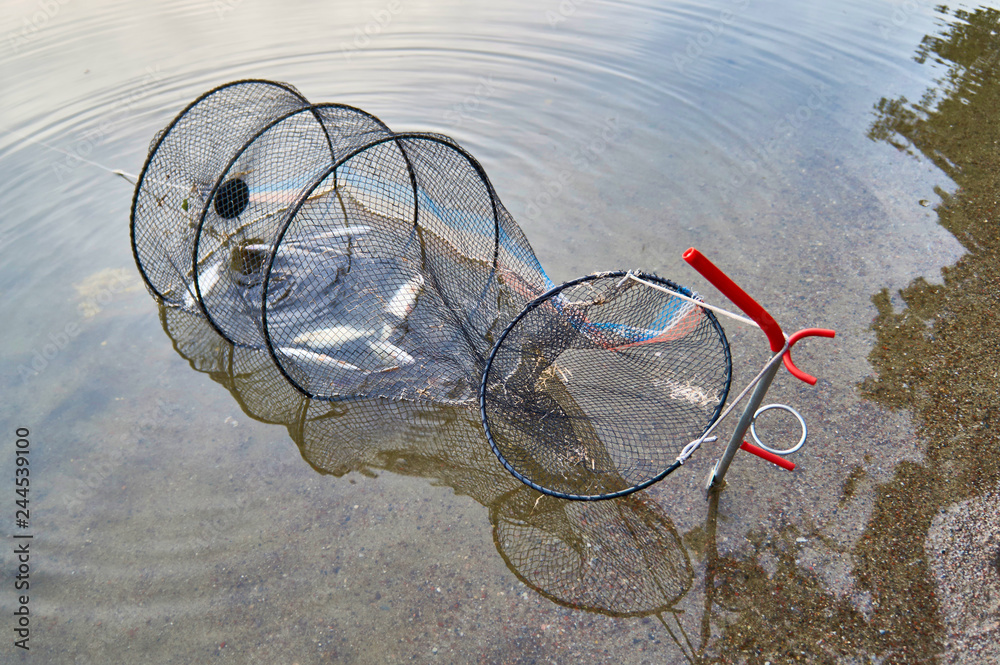 Net for fish over Lemiet lake in Mazury district, Poland. Fantastic travel destination. Net for fish over Lemiet lake in Mazury district, Poland. Fantastic travel destination.