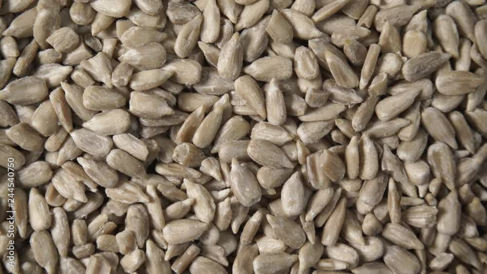 Sunflower seeds as natural food background or texture. Top view. Healthy food Sunflower seeds as natural food background or texture. Top view. Healthy food