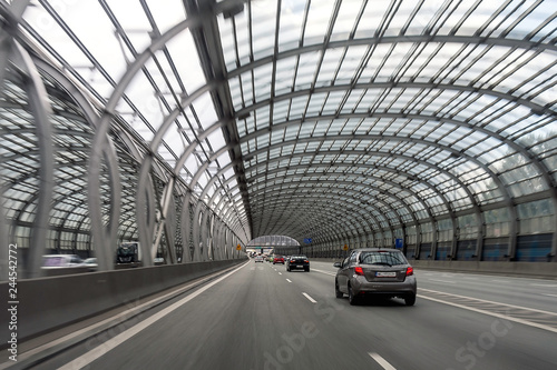 Expressway in Warsaw. Glass tunnel on the highway