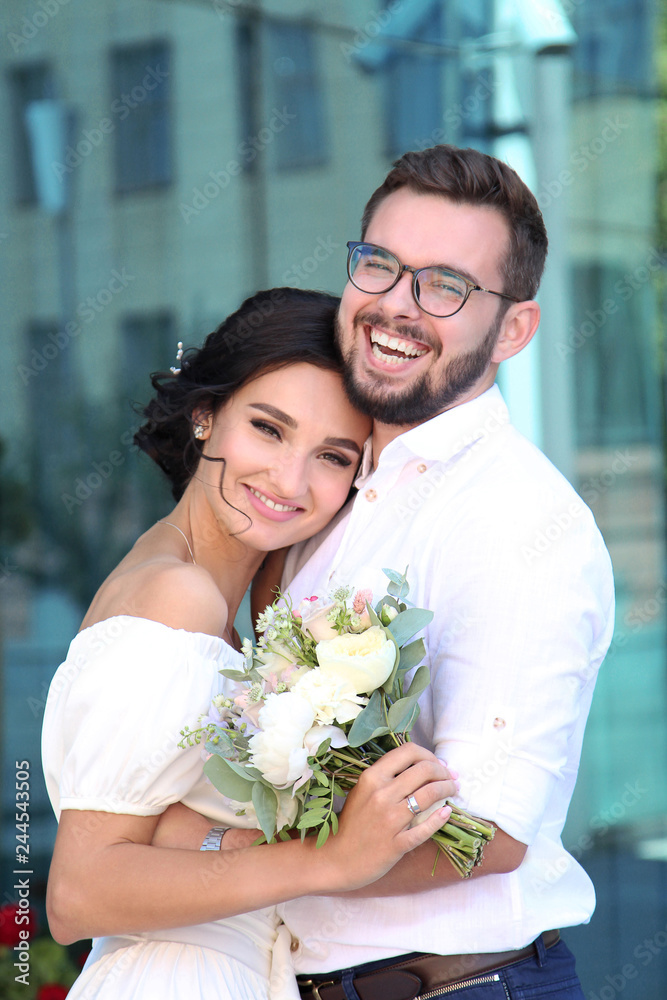 Happy beautiful young couple laughing hugging each other. Happy couple Happy beautiful young couple laughing hugging each other. Happy couple