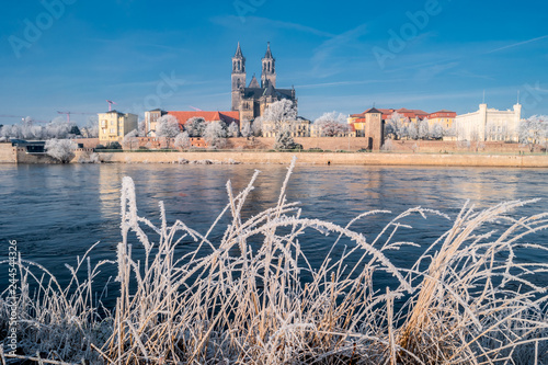 First frost over amazing sunrise in Magdeburg downtown in Winter, Germany, sunny day, morning