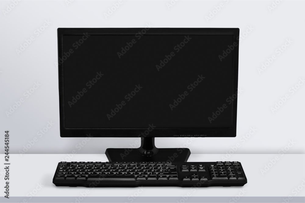 Desktop computer and keyboard on background Desktop computer and keyboard on background
