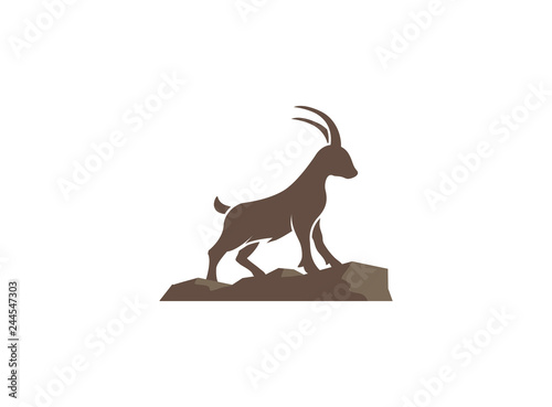 mountain goat symbol stand on rocks logo