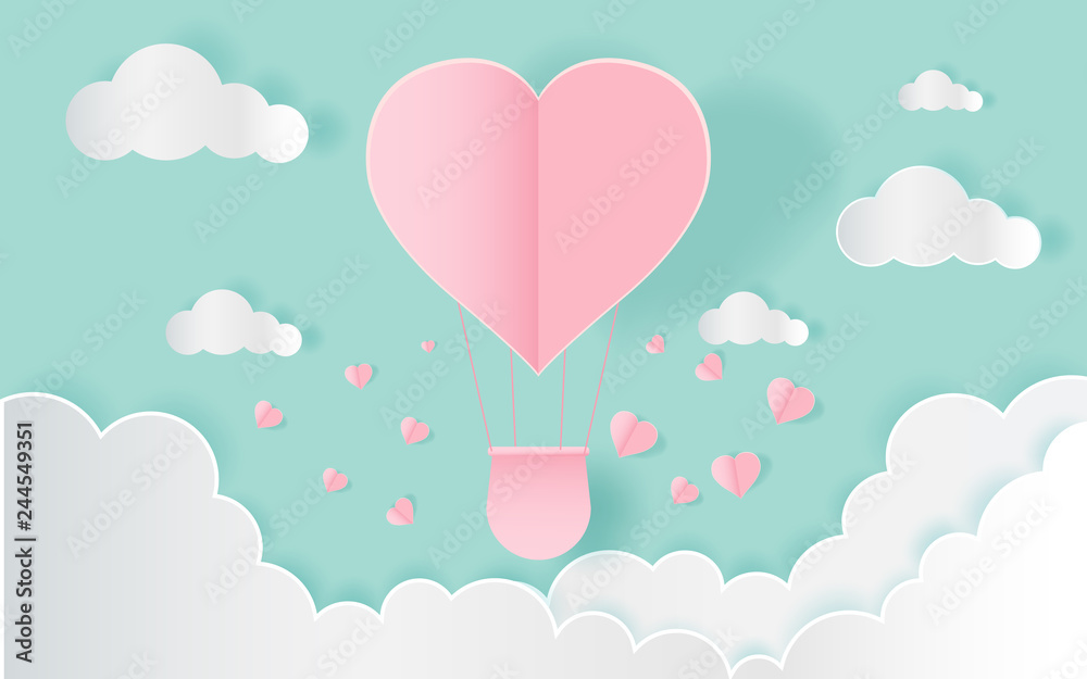  love and valentine day,Origami made hot air balloon flying on the sky with heart float on the sky.paper art 