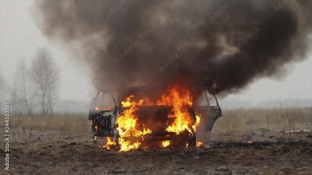 Car On Fire, Burning Car In The Field, Front View