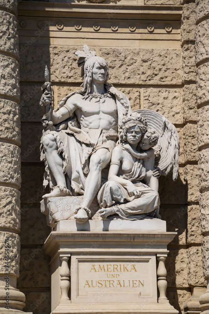 Allegoric sculptures of America and Australia continents on a front facade of Natural History Museum in Vienna, Austria