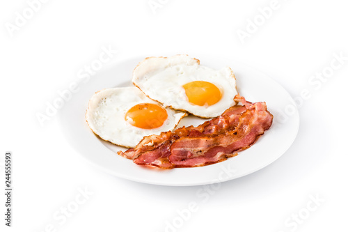 Fried eggs and bacon for breakfast isolated on white background

