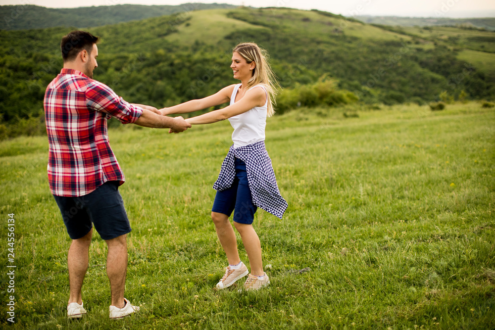Loving coulpe having fun in the spring nature Loving coulpe having fun in the spring nature