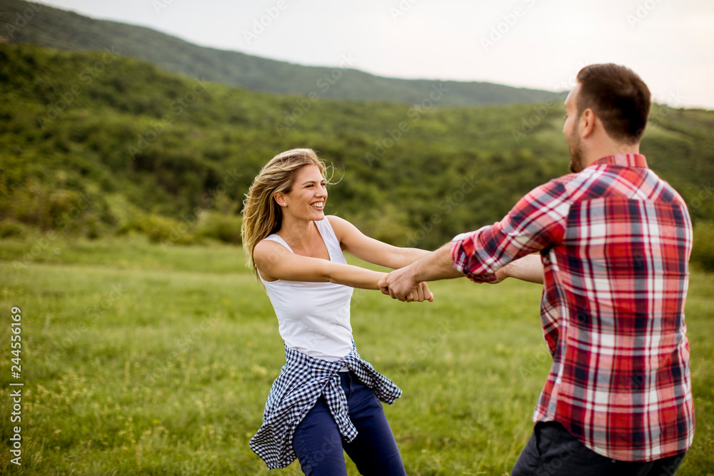 Loving coulpe having fun in the spring nature Loving coulpe having fun in the spring nature