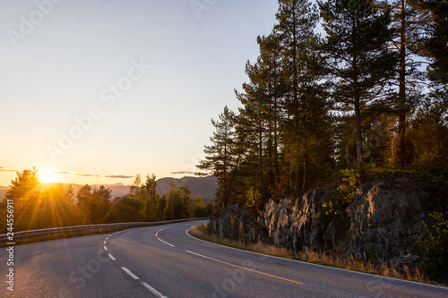 Sunset on Norway road on autumn