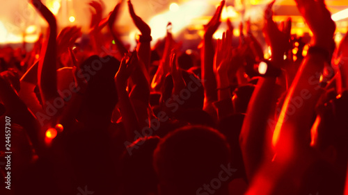 abstract colorful background audience in public concert.