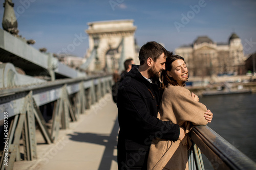 Loving couple on Chain bridge, Budapest © BGStock72