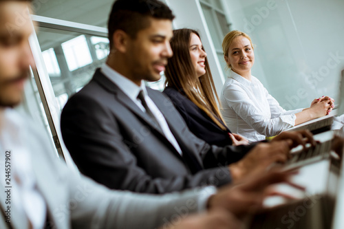 Group of business people sharing their ideas in the office