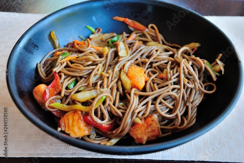Buckwheat noodles with salmon and vegetables in Moscow, Russia