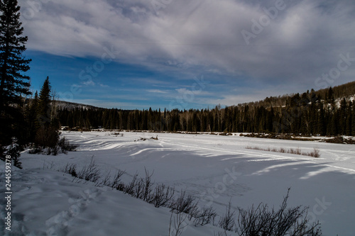 Snowed over creek bed at Bragg Creek Provincial Park, Alberta, Canada
