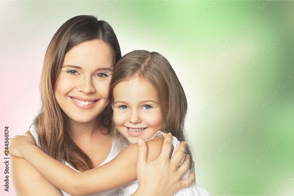 Happy Mother and daughter hugging Happy Mother and daughter hugging