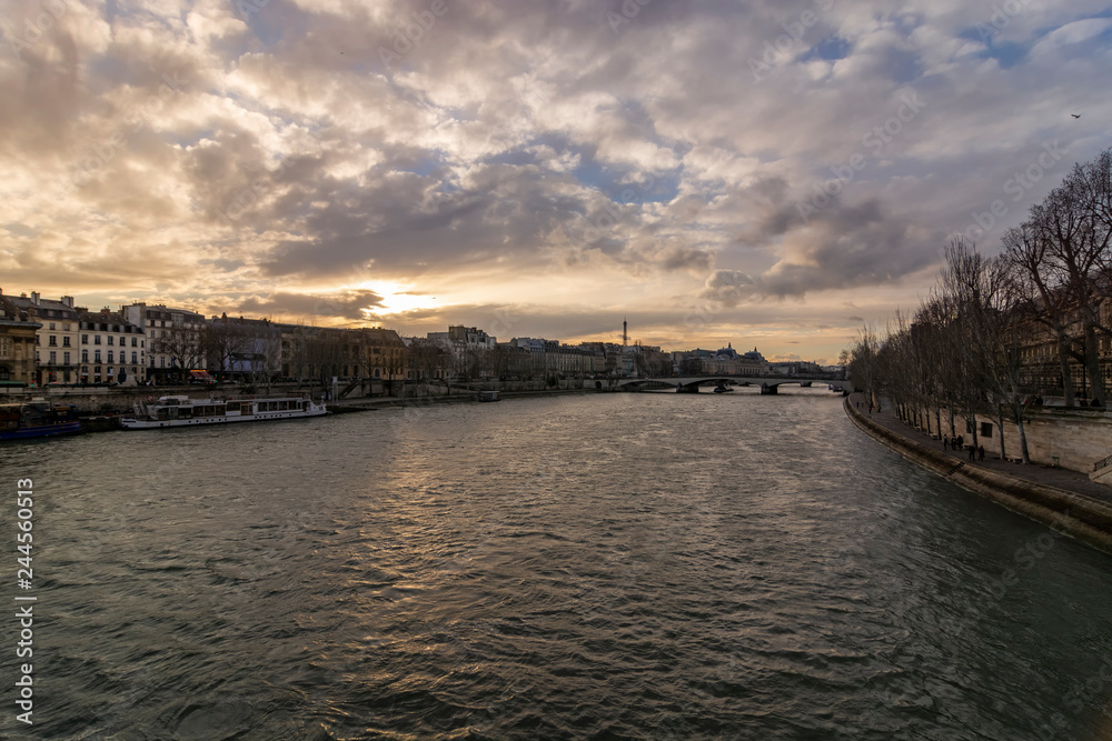 Fototapeta premium Beautiful sunset above the Seine river, Paris, France.