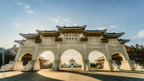 4K Time lapse of front gate of Chiang Kai-shek Memorial Hall at dawn, Taipei, Taiwan. Camera pan down.