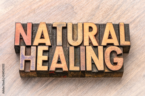 natural healing word abstract in wood type photo