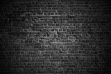Dark rough brick wall