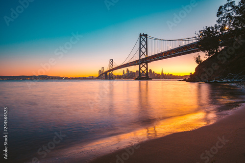 San Francisco skyline with Oakland Bay Bridge at twilight, California, USA © JFL Photography