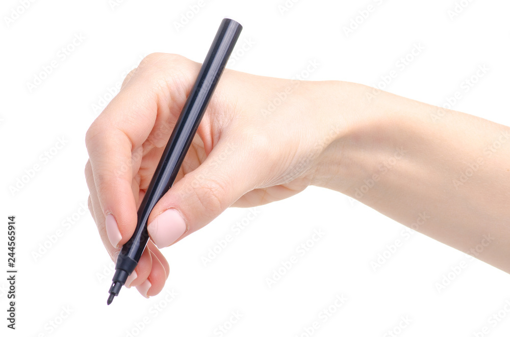 Black marker in hand on white background isolation Black marker in hand on white background isolation