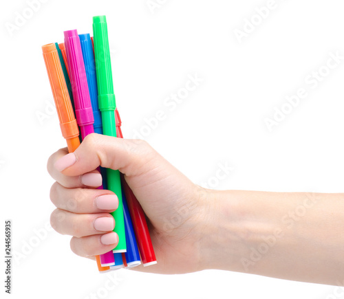 Color markers in hand on white background isolation