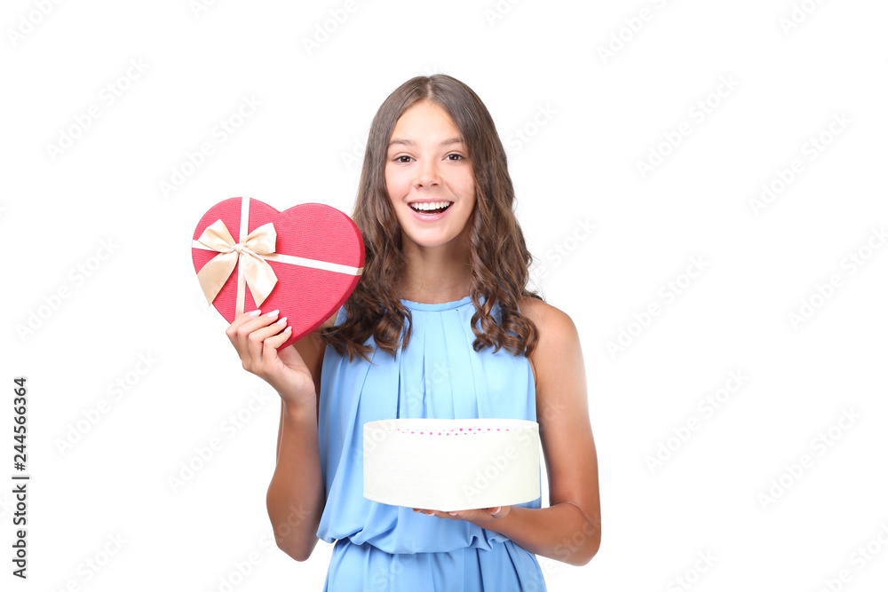 Young girl holding gift box isolated on white background Young girl holding gift box isolated on white background