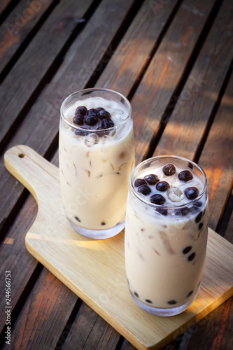 Bubble milk tea in glass. Trendy beverage in Asia. Sweet drink with tapioca.
