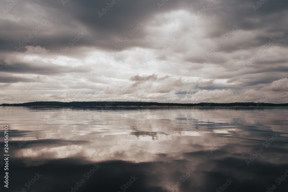 Cloudy reflections in the Amazon river