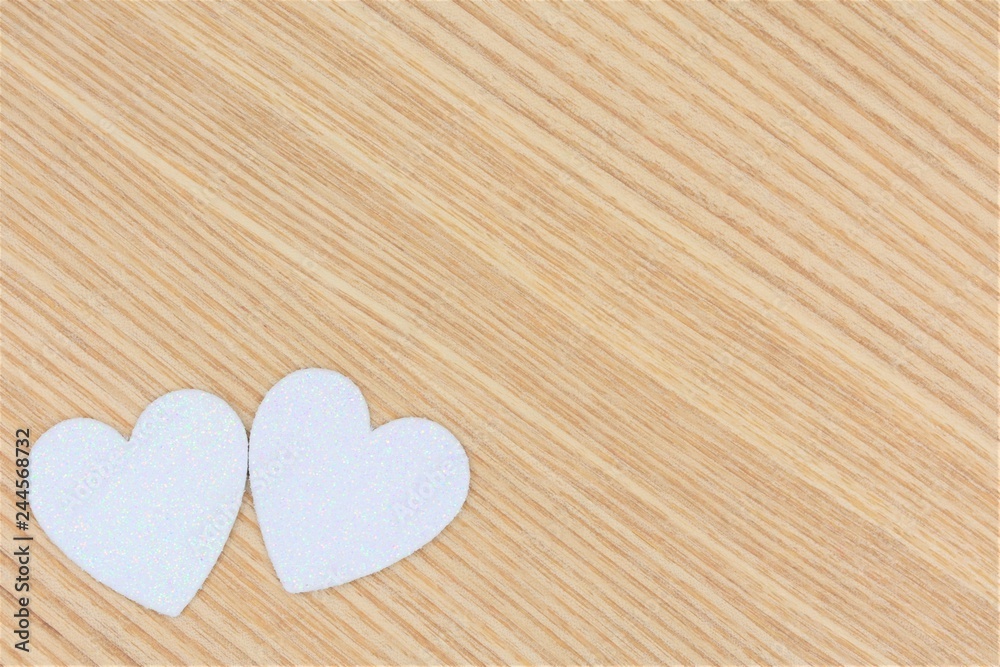 White hearts on a wooden background with space for text White hearts on a wooden background with space for text