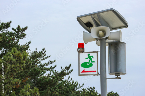 Japanese tsunami alert siren speaker system sign to introducing to saft zone.