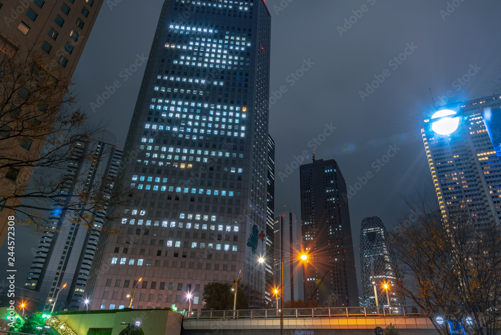Naklejka premium Shinjuku business landmark buildings at night, Shinjuku, Tokyo, Japan