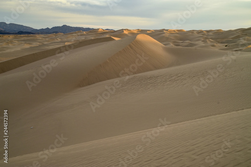 sunrise walk in sand dunes  Imperial Sand Dunes  California  USA