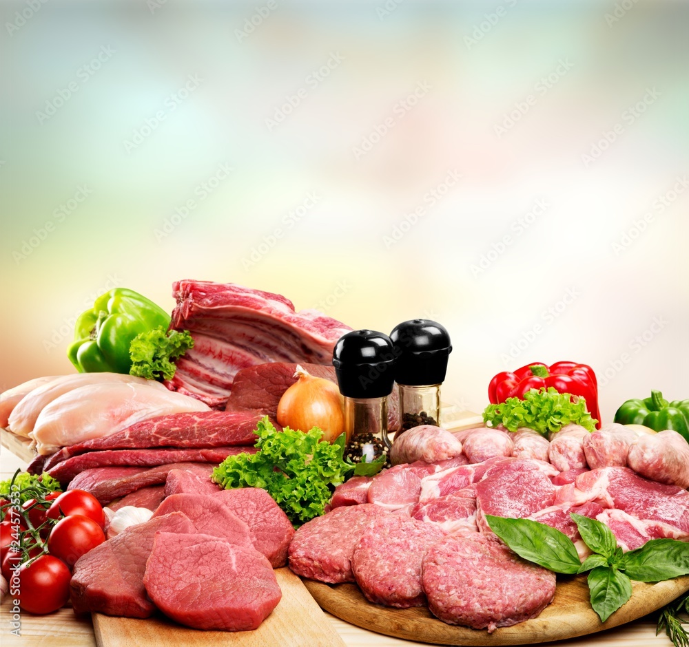 Fresh Raw Meat Background with vegetables Fresh Raw Meat Background with vegetables