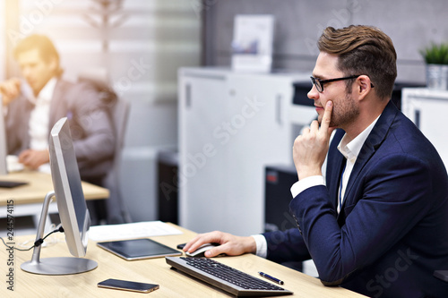 Close up portrait of businessman at workplace