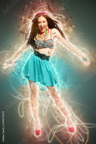 Young sexy dancing woman, with flashes on background, ray of light and neon