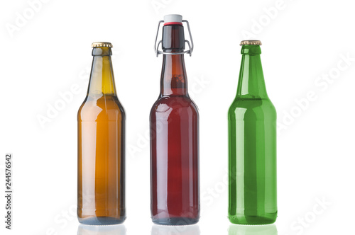 Three beer bottles on white background