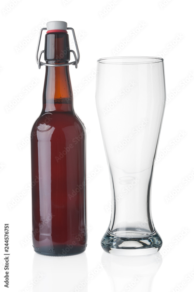 Beer bottle and empty glass on white background Beer bottle and empty glass on white background