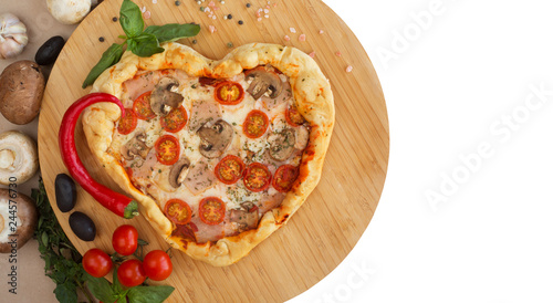 Pizza heart shaped on wood