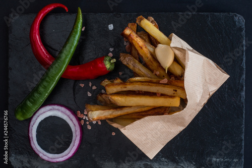 Canvas Print French fries in a paper cup